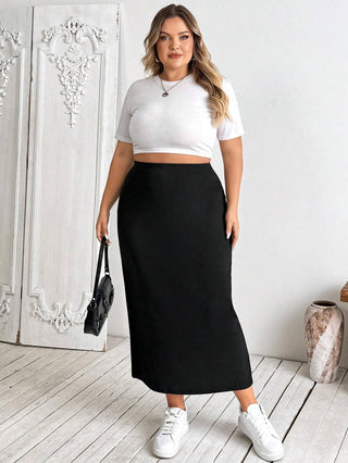 Falda lápiz midi elástica negra de talla grande para mujer