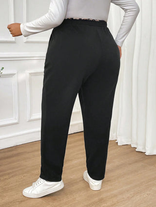 Pantalones negros casuales y cómodos para mujer, con estampado de leopardo, cintura elástica, bolsillos, para mujeres con curvas