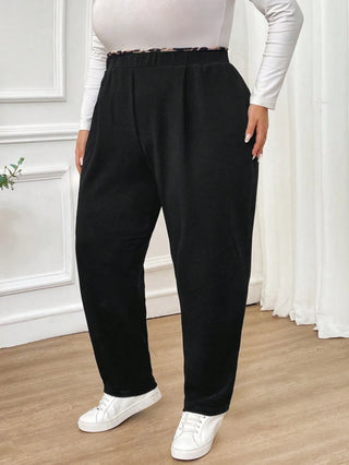 Pantalones negros casuales y cómodos para mujer, con estampado de leopardo, cintura elástica, bolsillos, para mujeres con curvas