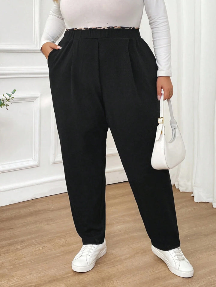 Pantalones negros casuales y cómodos para mujer, con estampado de leopardo, cintura elástica, bolsillos, para mujeres con curvas