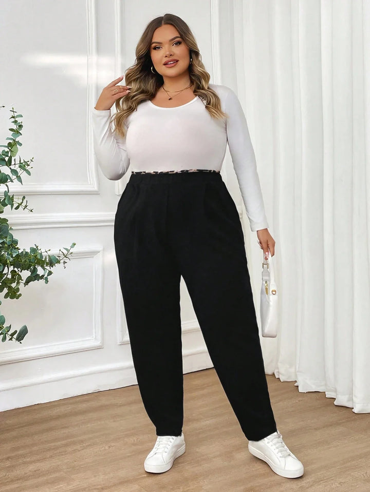 Pantalones negros casuales y cómodos para mujer, con estampado de leopardo, cintura elástica, bolsillos, para mujeres con curvas