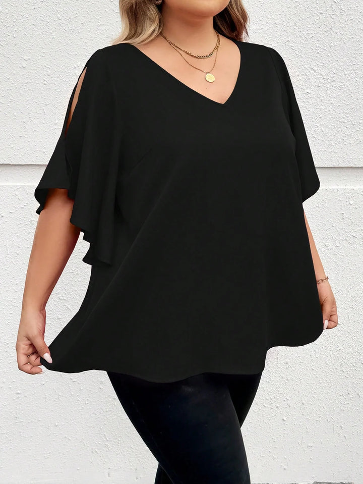 Camisa oversize con escote en V, mangas con volantes y abertura