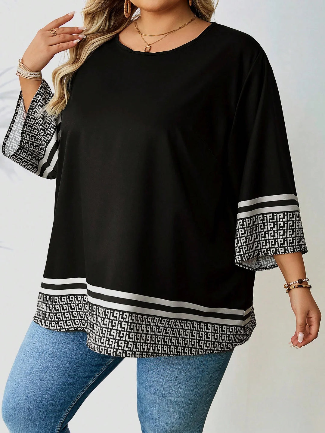 Camiseta casual amplia con estampado integral, escote redondo, mangas de 3/4 para tallas grandes de mujer