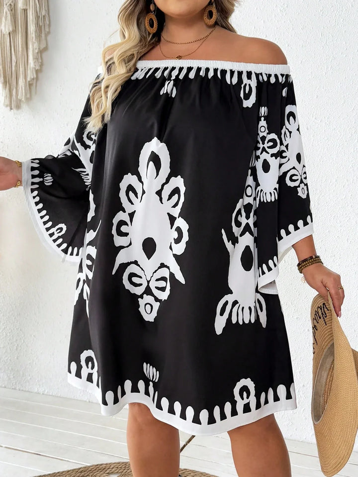 Vestido mini de manga larga, con estampado, modelo amplio y hombros descubiertos