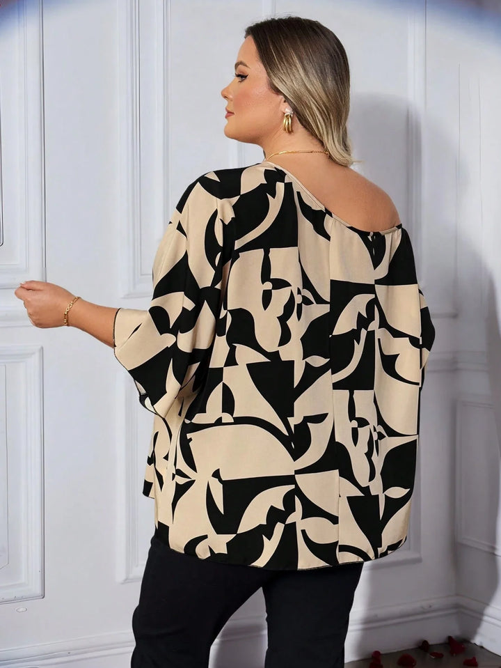 Blusa con hombro asimétrico y estampado geométrico para tallas grandes