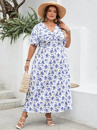 Vestido casual de vacaciones de manga corta con estampado floral boho y nudo frontal, adecuado para tallas grandes