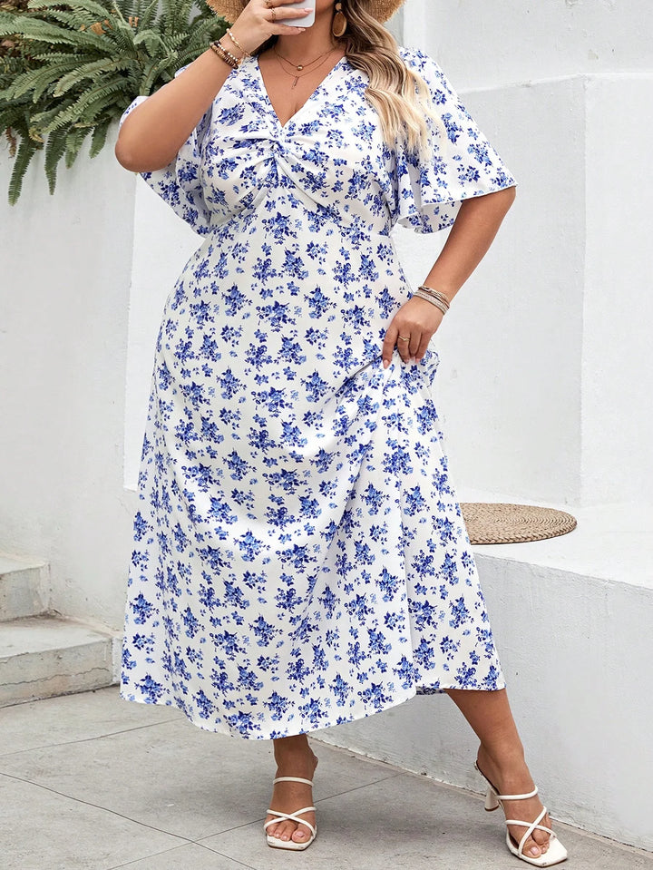 Vestido casual de vacaciones de manga corta con estampado floral boho y nudo frontal, adecuado para tallas grandes