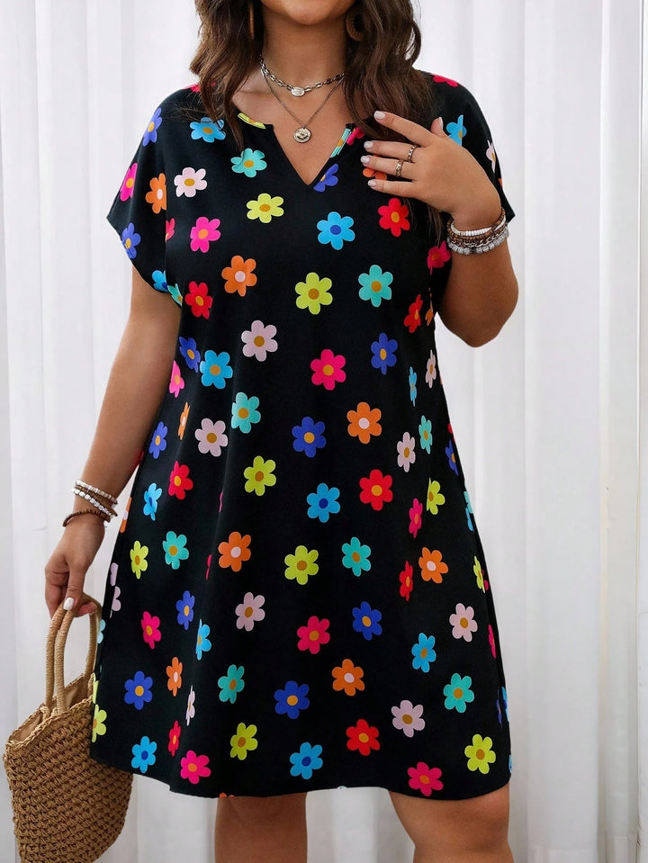 Vestido de vacaciones con mangas murciélago, escote en pico, estampado floral colorido