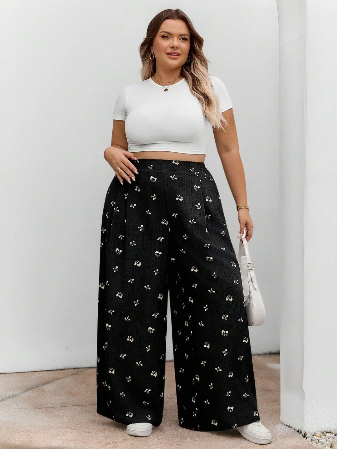 Pantalones largos de cintura elástica en tejido negro con estampado floral, casuales, cómodos y ligeros