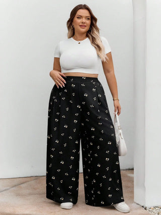 Pantalones largos de cintura elástica en tejido negro con estampado floral, casuales, cómodos y ligeros