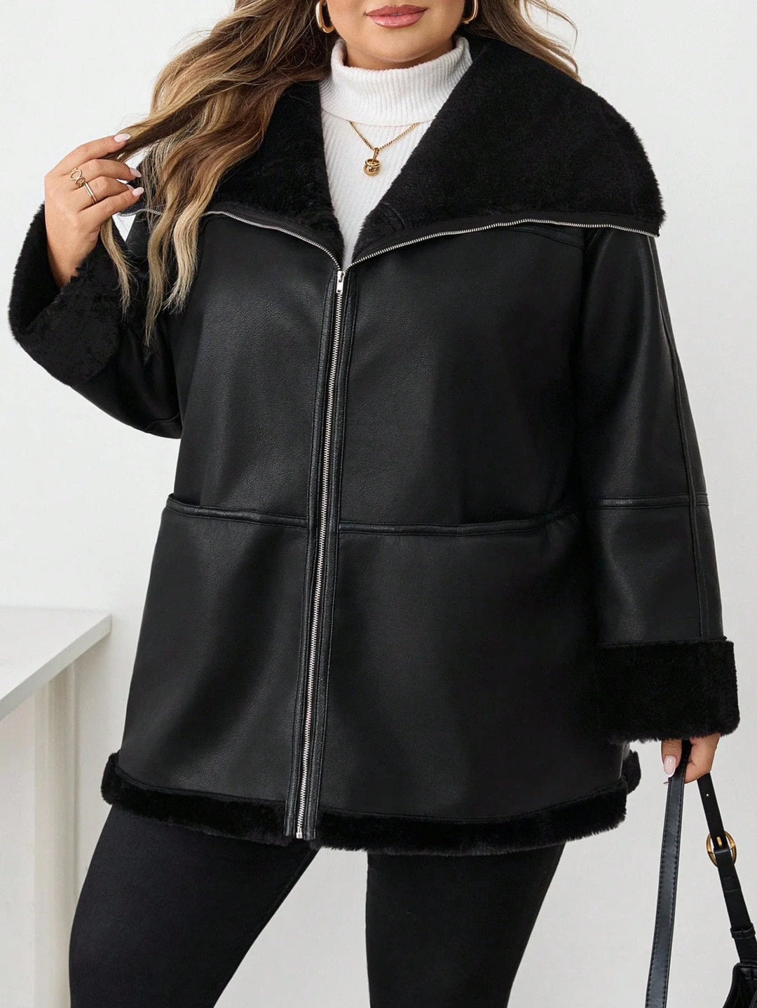 Chaqueta casual de ecopiel con cremallera frontal y bolsillos, talla oversize