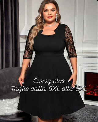 Vestido elegante de color sólido con inserciones de encaje, tallas cómodas.