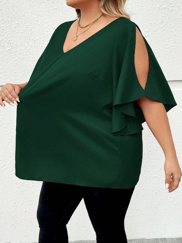 Camisa oversize con escote en V, mangas con volantes y abertura